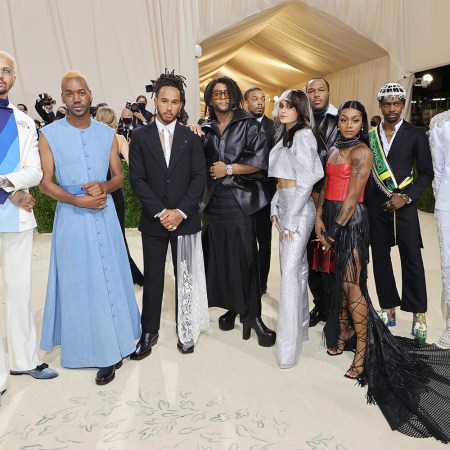 Lewis Hamilton, third from left in a black suit with white lace, and those he invited to the 2021 Met Gala, including Black fashion designers, creatives and athletes