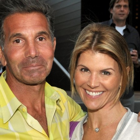 Lori Loughlin and her husband Mossimo Giannulli attend the Malibu Lumber Yard grand opening held at the Malibu Lumber Yard on April 21, 2009 in Malibu, California