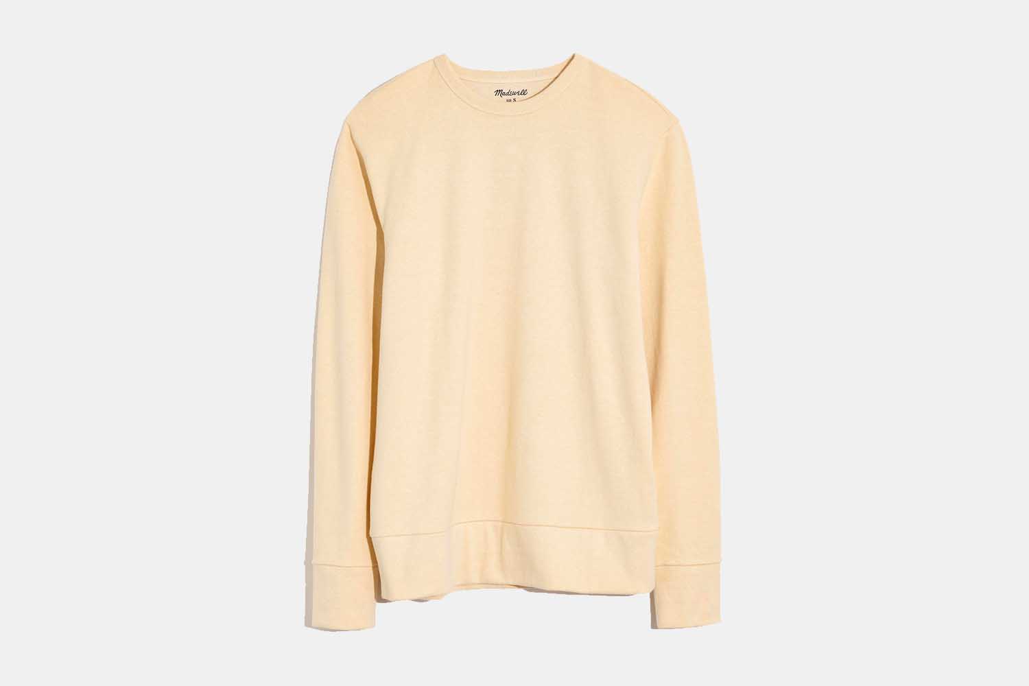 A cotton-hemp men's sweatshirt from Madewell in the color alabaster on a grey background