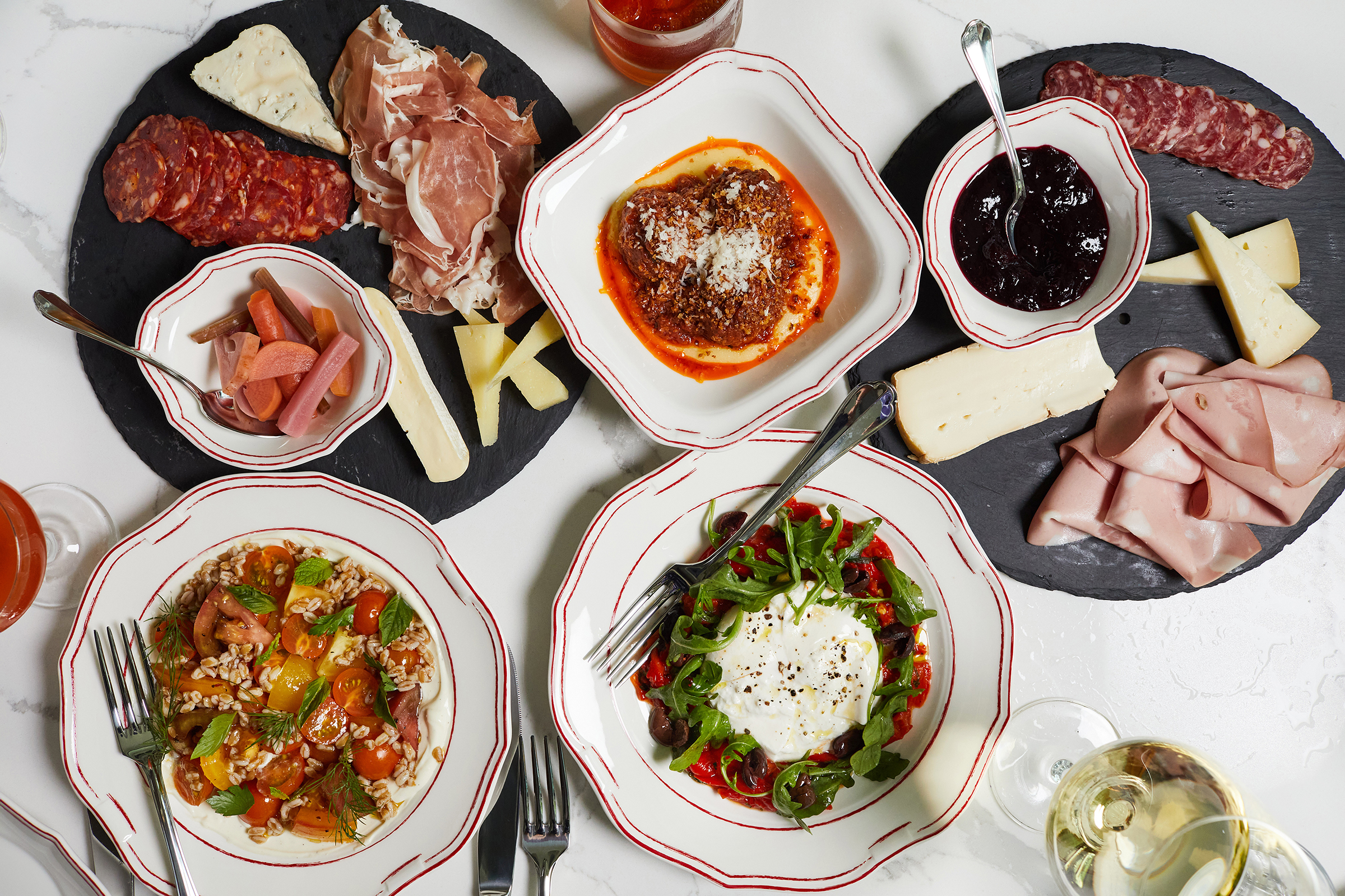 A spread of salads and antipasti at Officina