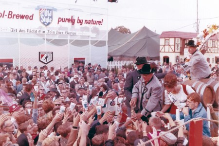 Festival goers gather in a large crowd at Oktoberfest USA in La Crosse, Wisconsin.