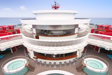 The upper decks of the Scarlet Lady, a new cruise ship from Virgin Voyages, launching soon