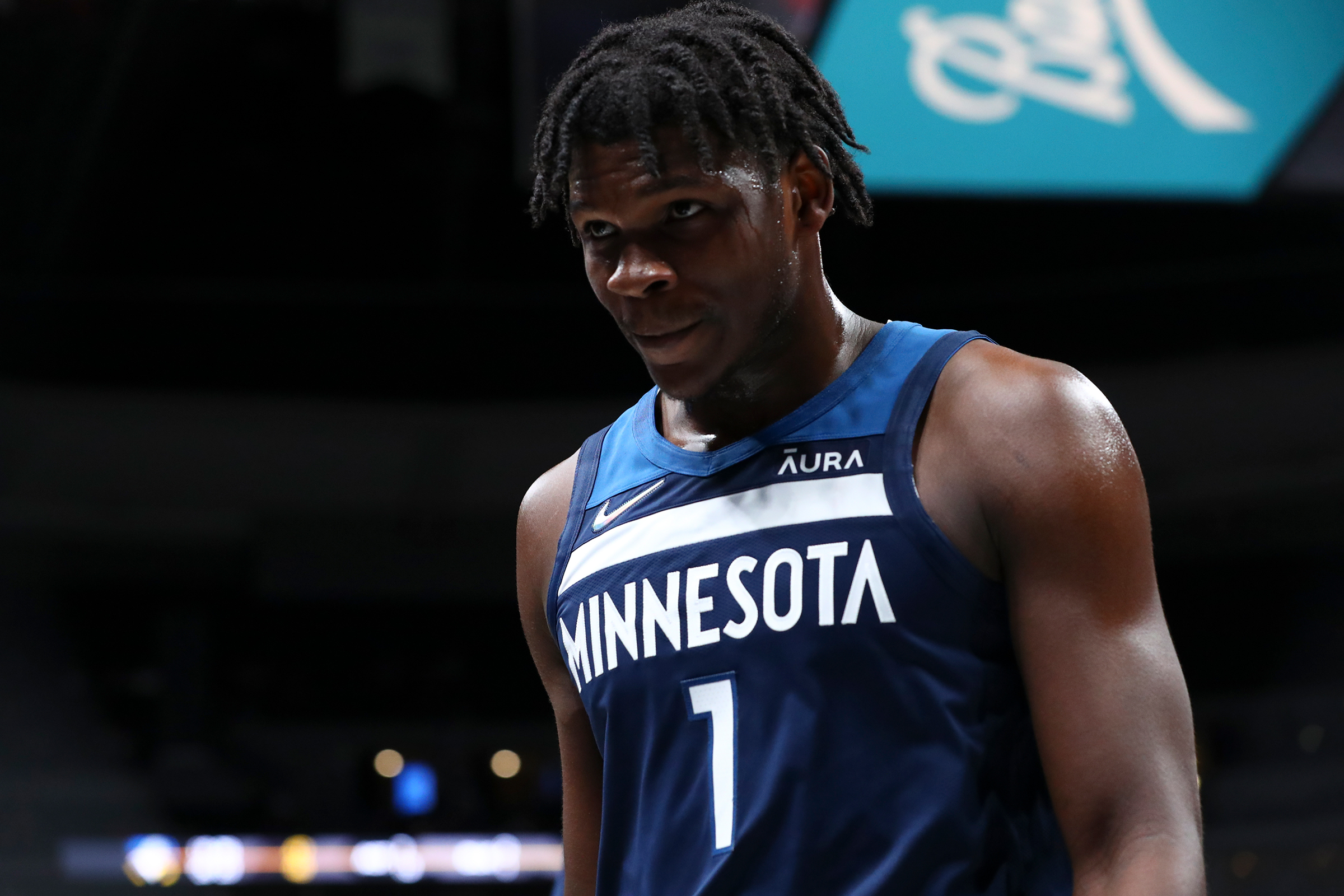 Anthony Edwards #1 of the Minnesota Timberwolves walks toward the locker room during half time against the Denver Nuggets at Ball Arena on October 8, 2021 in Denver, Colorado.