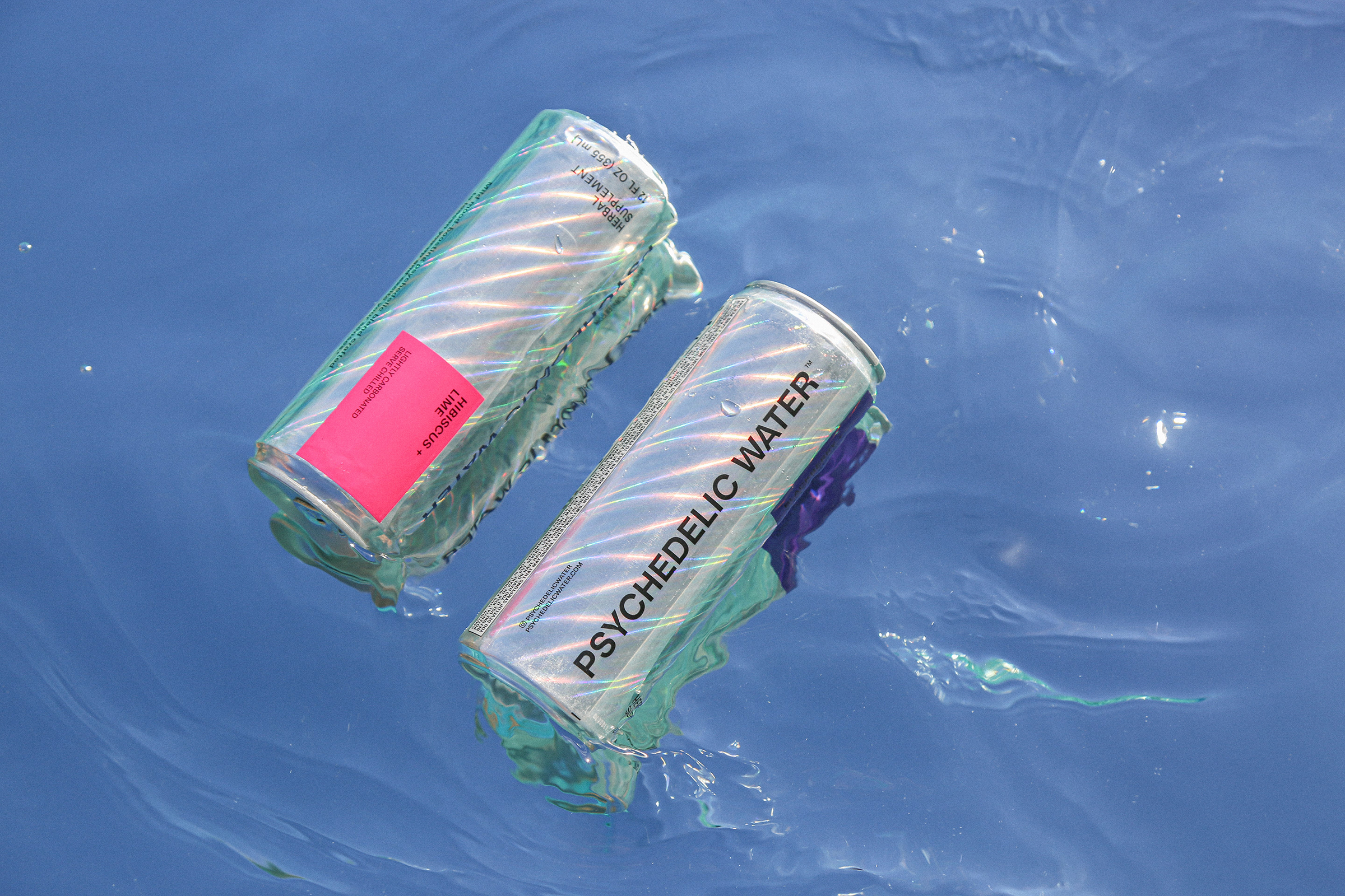 Psychedelic Water cans floating in water