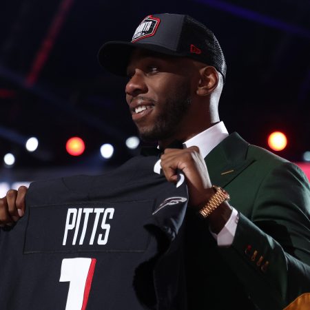 Kyle Pitts poses after being selected fourth overall by the Atlanta Falcons