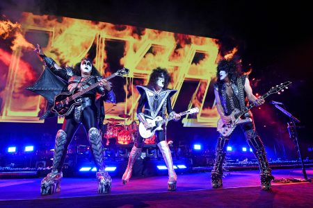 Gene Simmons, Tommy Thayer, and Paul Stanley of KISS perform onstage during the Tribeca Festival screening of "Biography: KISStory" at Battery Park on June 11, 2021 in New York City. A guitar tech for the band recently died of COVID-19, which other roadies are blaming on the band's tour protocols.