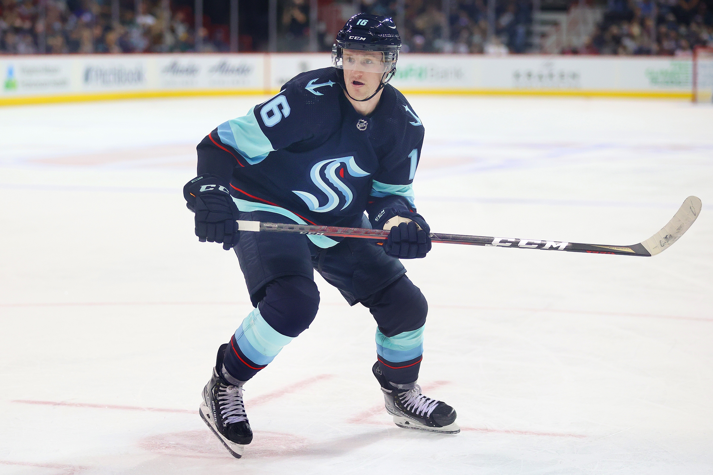 Jared McCann #16 of the Seattle Kraken skates against the Vancouver Canucks in the third period during a preseason game at Spokane Veterans Memorial Arena on September 26, 2021 in Spokane, Washington.