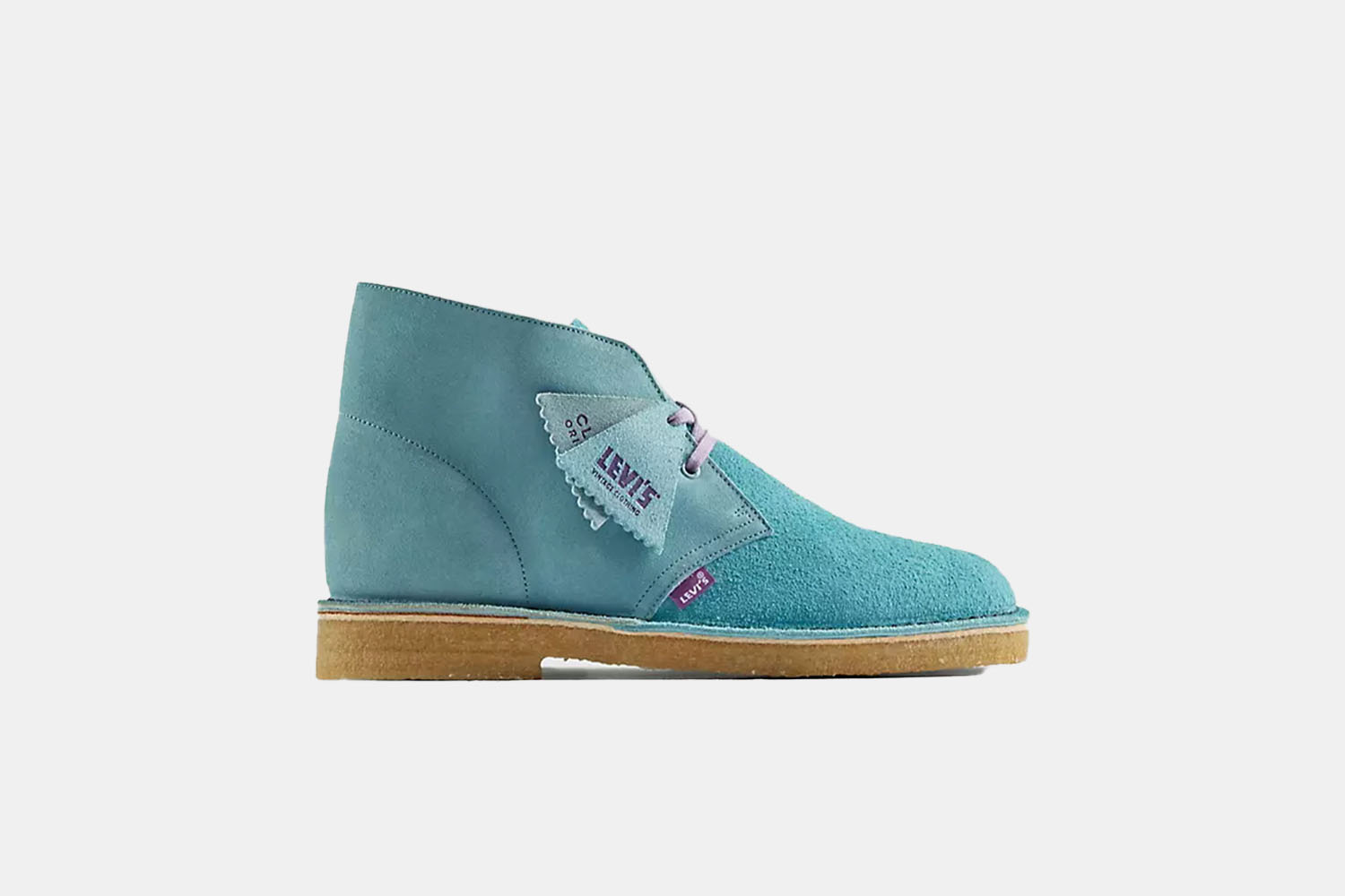 a light blue desert boot