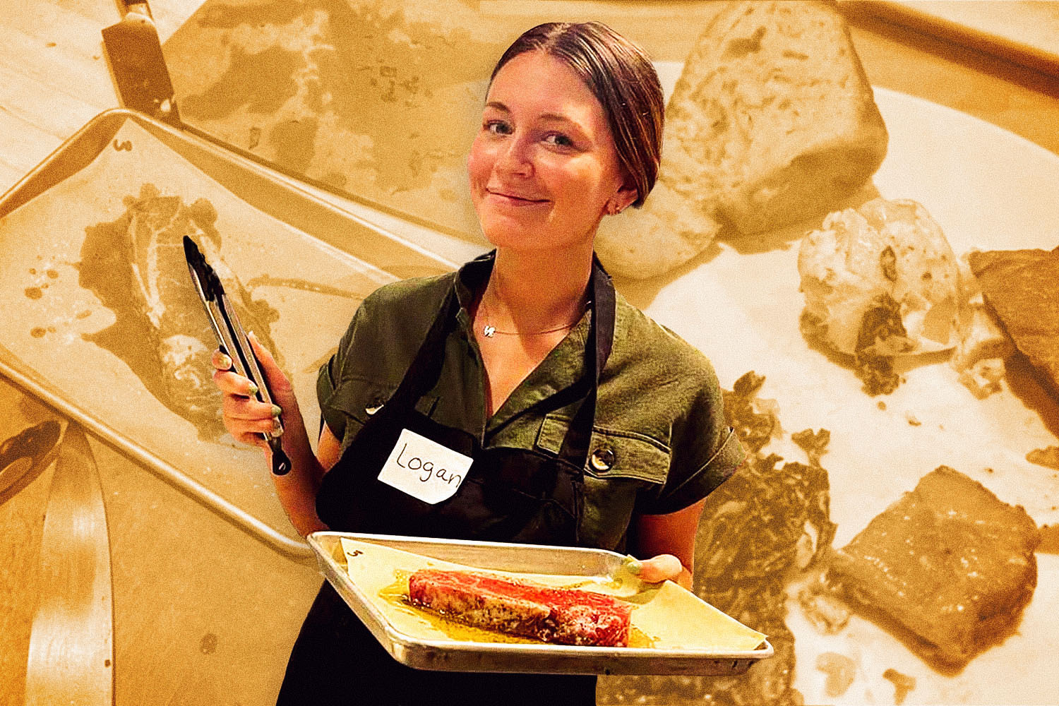 A brunette holding tongs and a steak at cooking class