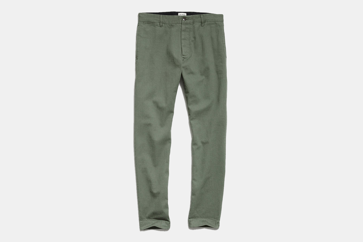 a pair of green chinos