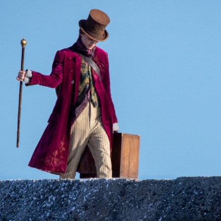 Timothée Chalamet is seen as Willy Wonka during filming for the Warner Bros and the Roald Dahl Story Company's upcoming movie 'Wonka' on October 11, 2021, in Lyme Regis, England. This film will focus on the young Willy Wonka on his earliest adventure and how he met the Oompa-Loompas. Some critics contend Chalamet is too "hot" to play Wonka