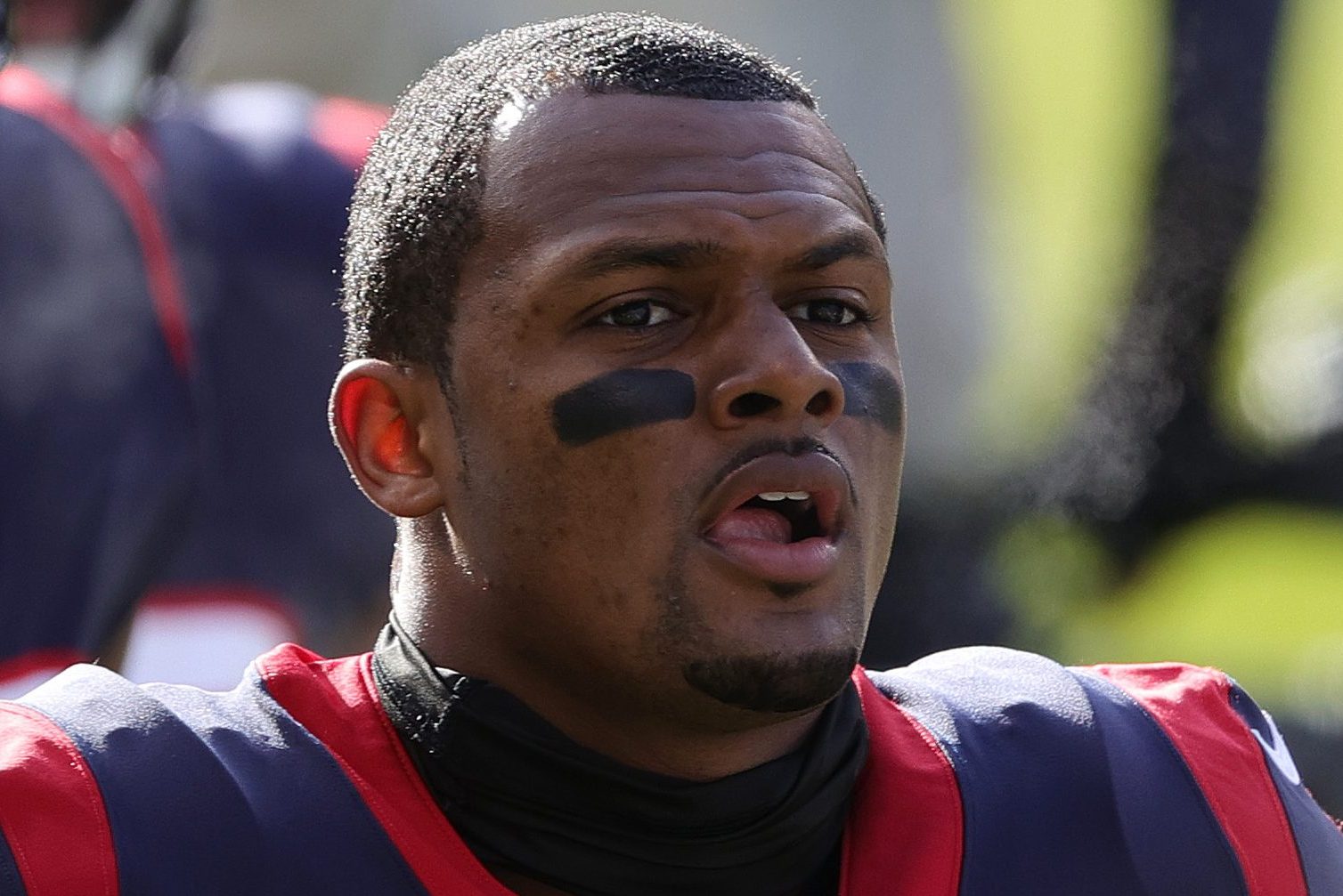 Deshaun Watson walks off the field after warmups