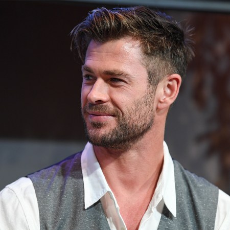 Chris Hemsworth smiling at a press event