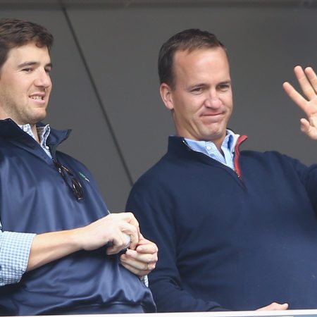 Eli and Peyton Manning at a New York Yankees game in 2014