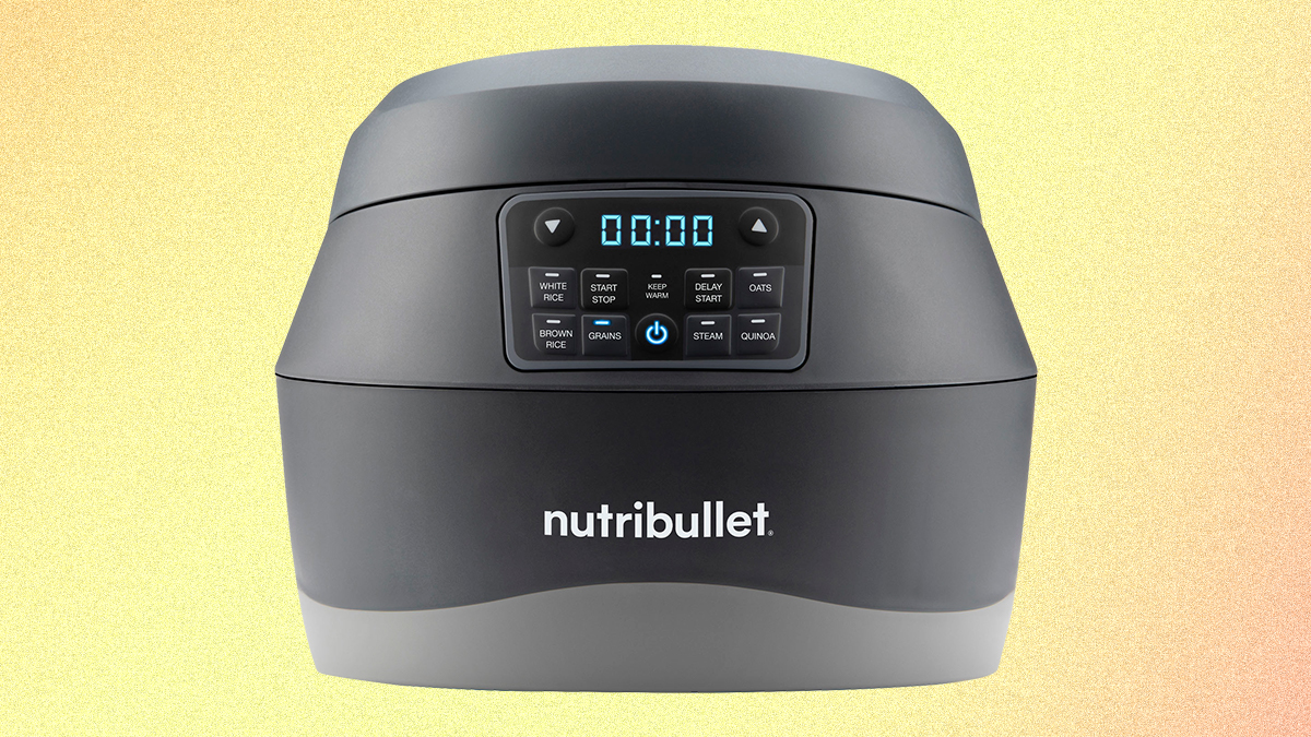 The Nutribullet EveryGrain Cooker, a new grain cooking appliance, on a yellow and orange background. We tested and reviewed the kitchen appliance to see if it's worth buying.