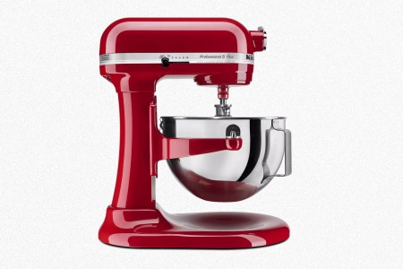 A red stand mixer from KitchenAid, the Professional 5 Plus Series 5 Quart Bowl-Lift model, on a grey background