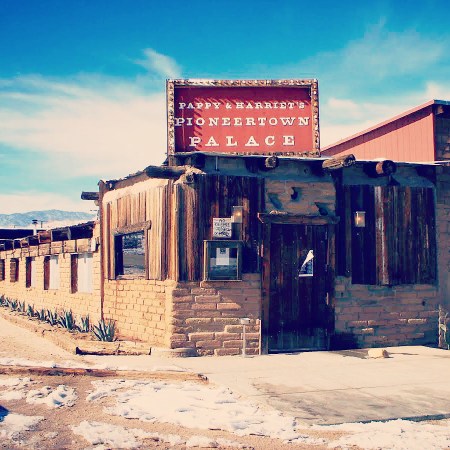 The entrance to roadside bar and restaurant Pappy and Harriet's in Joshua Tree