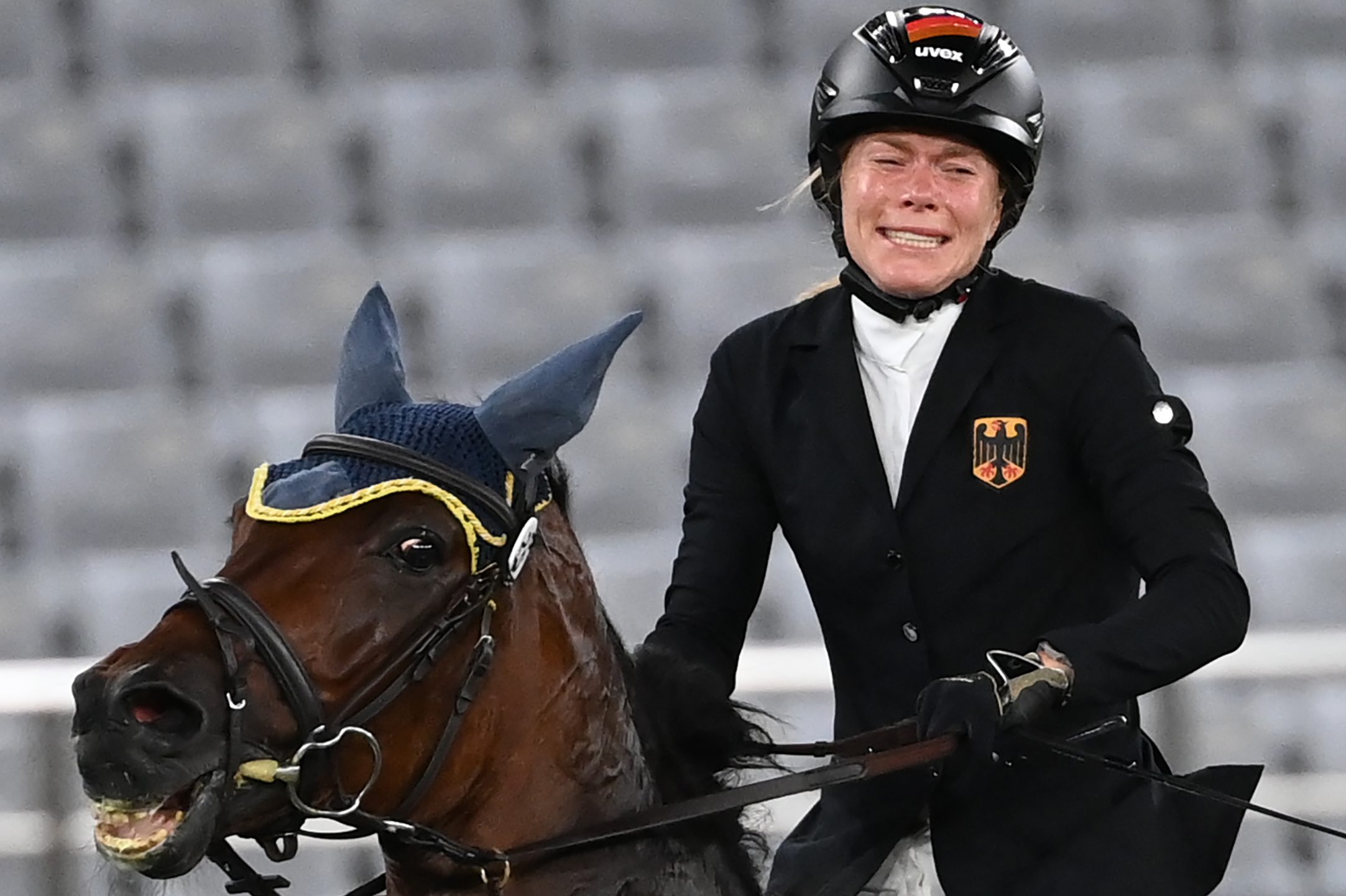 German rider Annika Schleu reacts after her disqualification in the pentathlon in Tokyo in 2021