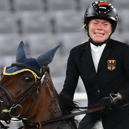 German rider Annika Schleu reacts after her disqualification in the pentathlon in Tokyo in 2021