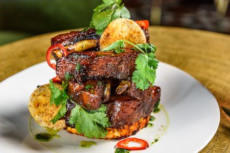 Chef Lorena Garcia of CHICA Aspen serves up al pastor baby back ribs