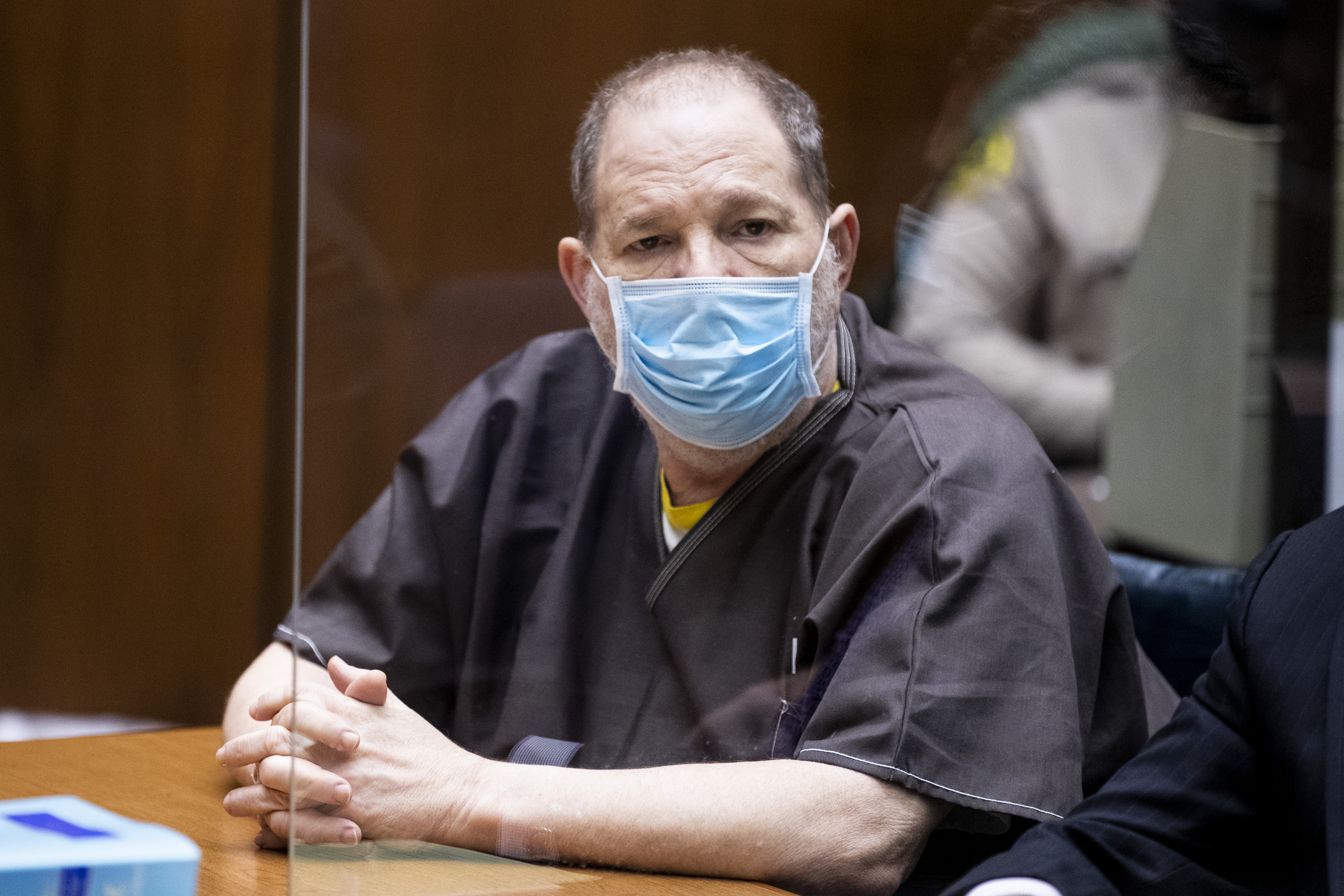 Harvey Weinstein listens in court during a pre-trial hearing for Weinstein, who was extradited from New York to Los Angeles to face sex-related charges at Clara Shortridge Foltz Criminal Justice Center on July 29, 2021 in Los Angeles, California.