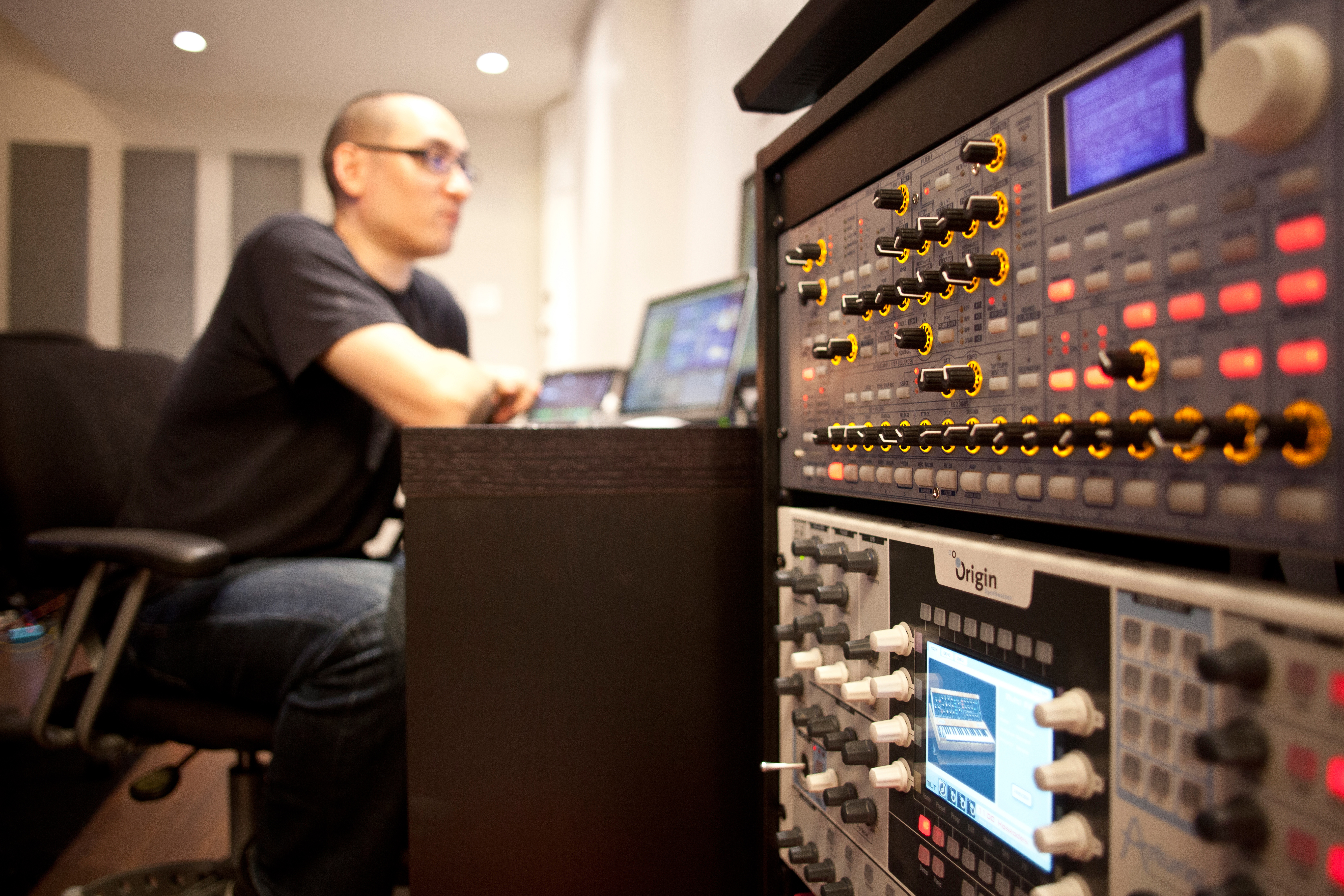 Portrait of American electronica musician and sound designer Richard Devine in his home studio in North Carolina