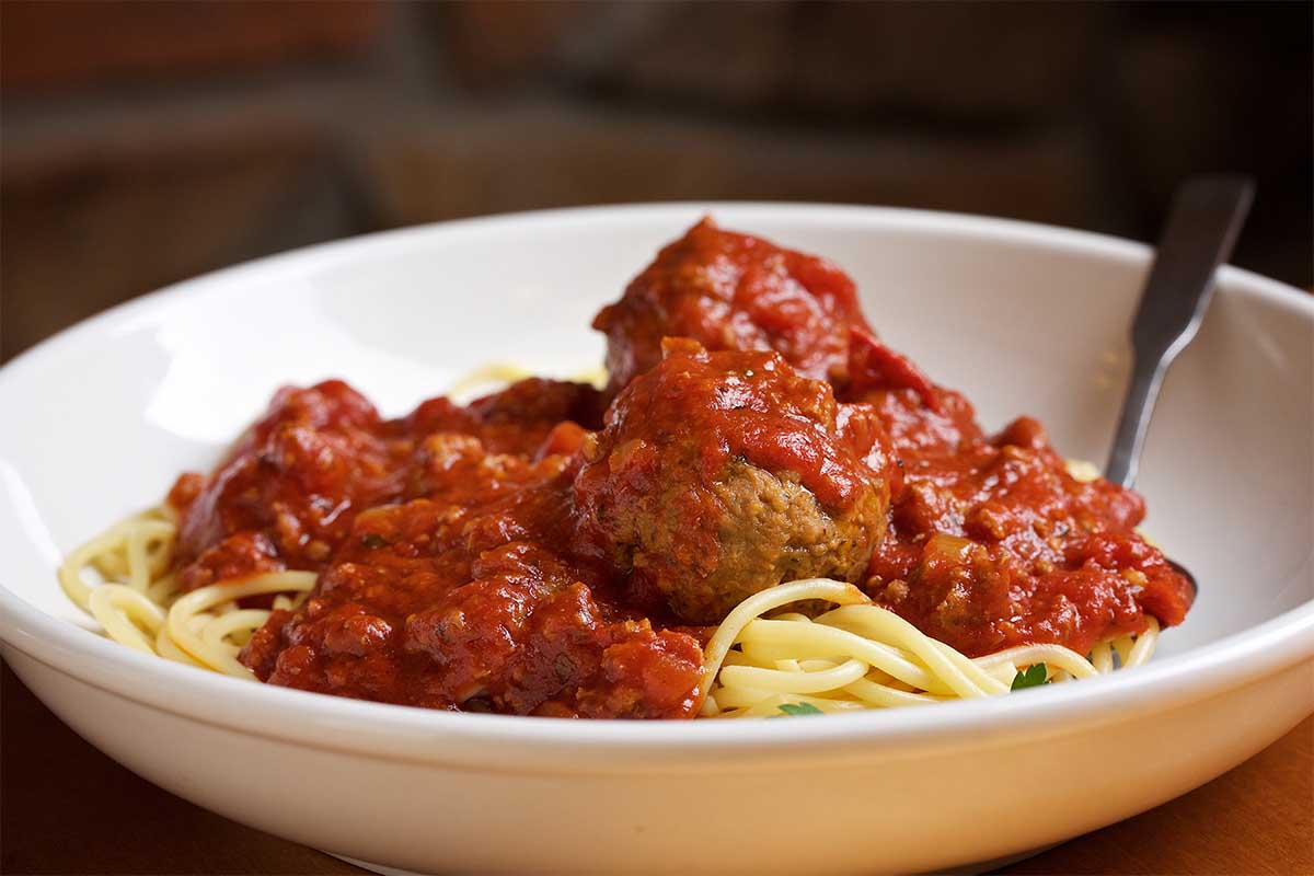 Create your own pasta--Spaghetti, Traditional Meat Sauce and Meatballs at Olive Garden photographed in Hyattsville, MD. The Never Ending Pasta Bowl at the chain may disappear next year.