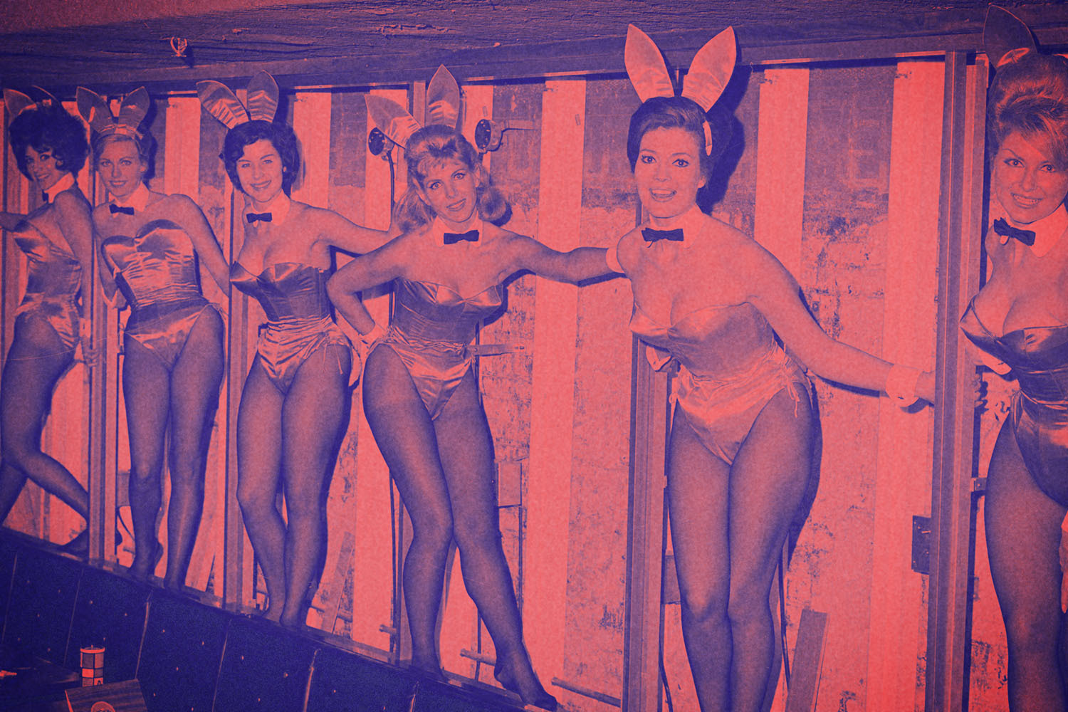 Playboy bunnies line the wall at the Playboy club