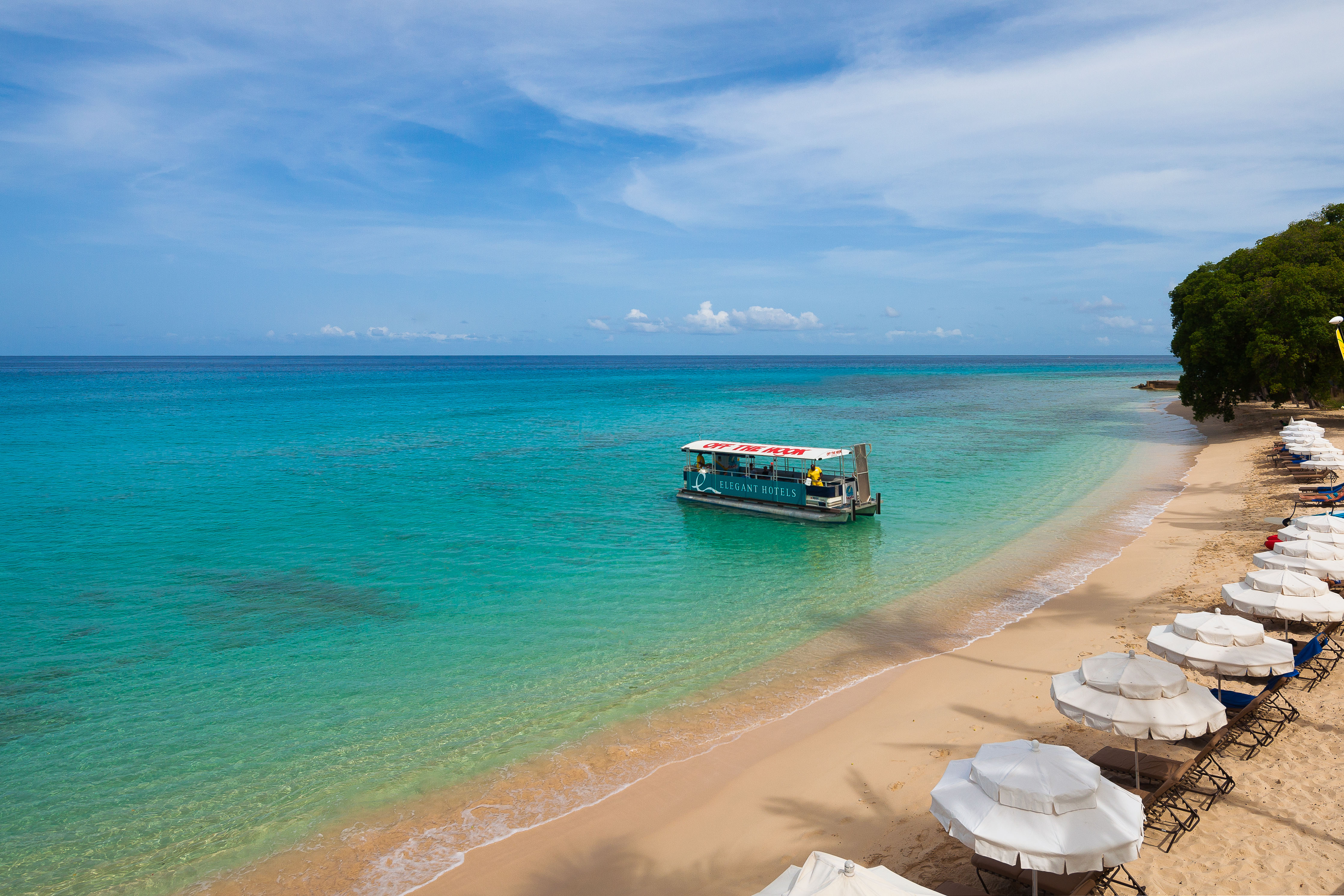 A water taxi at Waves Hotel transports guests to other Elegant properties