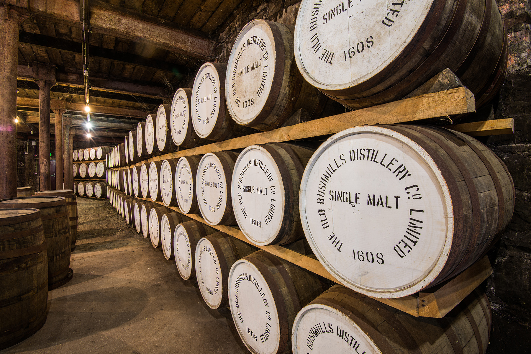 Whiskey ages in one of the barrel rooms at the Bushmlils distillery in Ireland