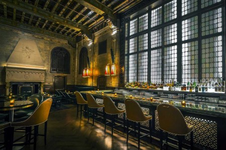 The Campbell Bar in Grand Central Station. Dimly lit bar with a fireplace.