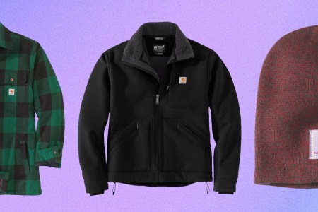 A men's sherpa-lined flannel shirt, a men's sherpa-lined Super Dux jacket and a knit beanie, all of which are on sale during Carhartt's Winter Sale of January 2022