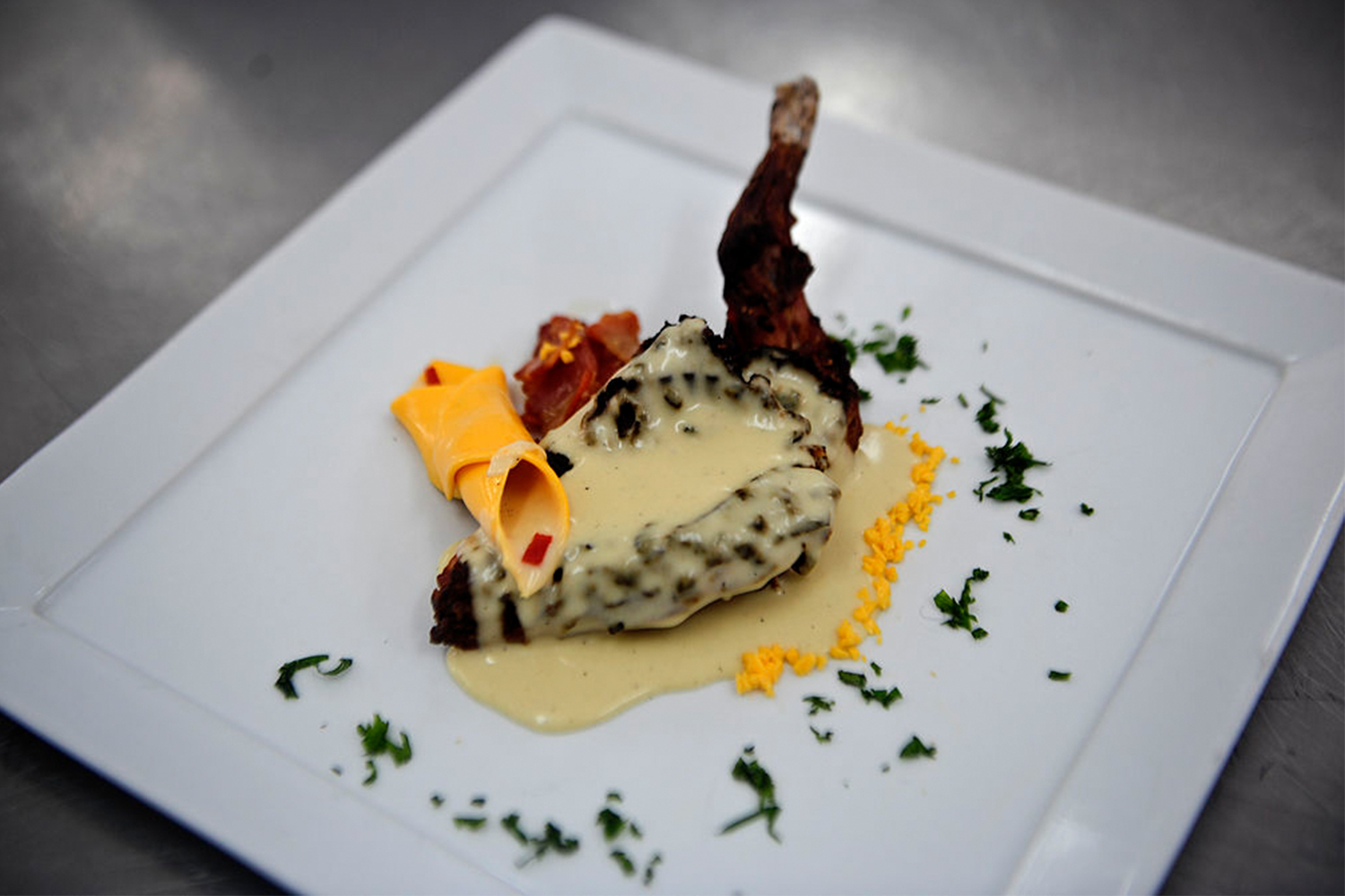 A dish made of cuy (Guinea pig) meat, prepared during a class at the Pachacutec Cooking Institute, northern outskirts of Lima on September 23, 2011