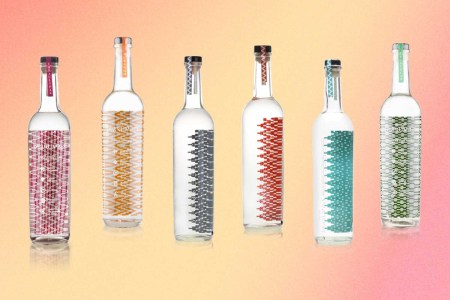 six bottles of Derrumbes Mezcal, a small, independently-owned mezcal brand from Jalisco