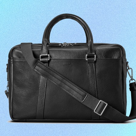 The Double-Zip Leather Briefcase and two Brakeman Coated Canvas and Leather Briefcases from Shinola that are on sale at Nordstrom Rack in January 2022