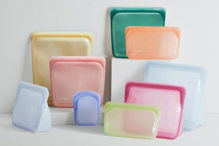 A collection of reusable Stasher platinum silicone bags in a variety of colors. Every kitchen should have this alternative to single-use plastic bags. Here's why.