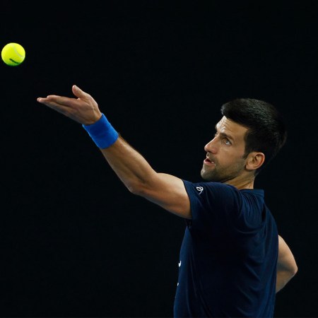 Novak Djokovic throws a tennis ball into the air. In a new interview with the BCC, the tennis star confirmed that his is not vaccinated against COVID-19 and has no plans to get a vaccine.