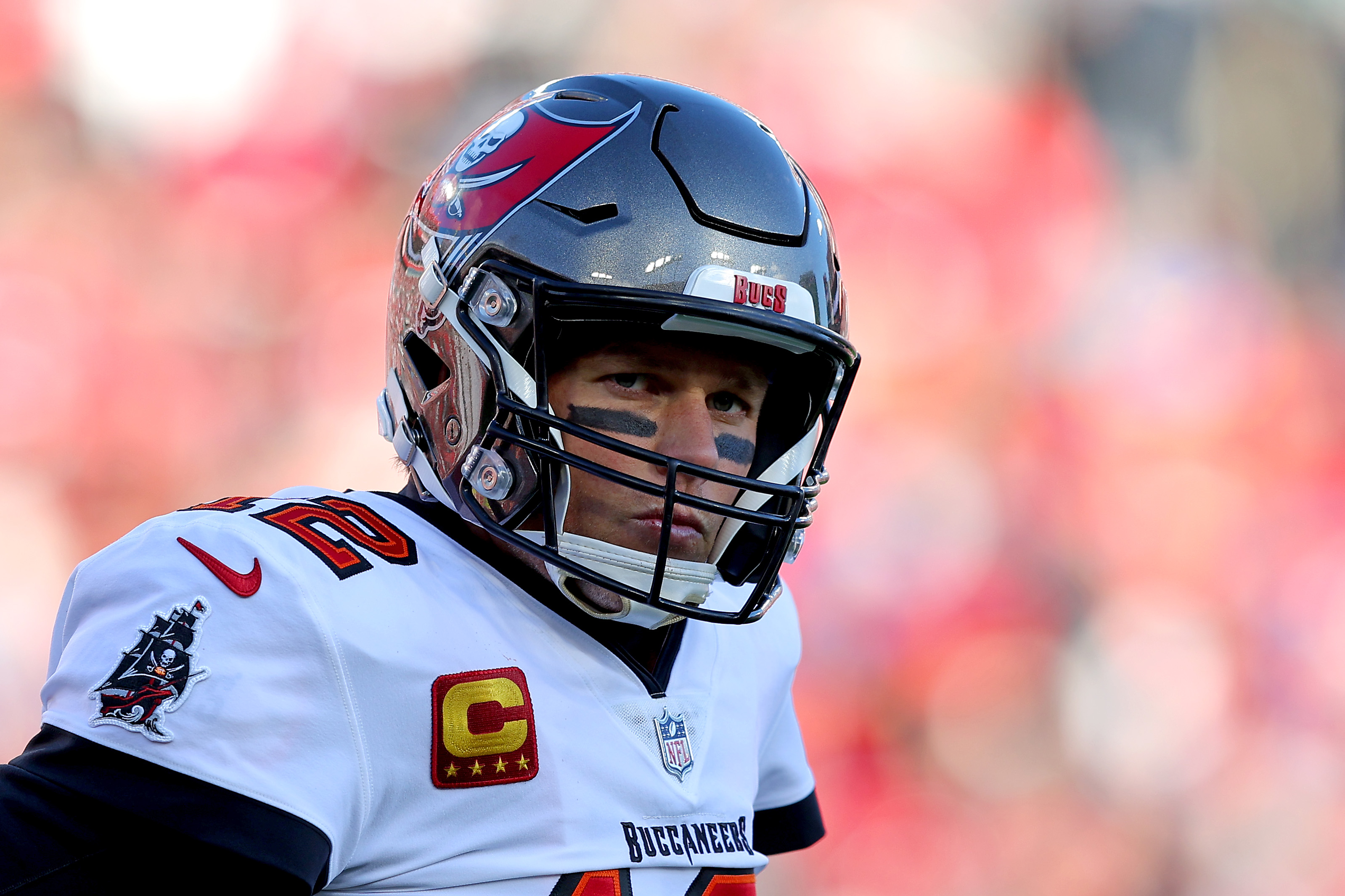 Tom Brady reacts in the second quarter of the game against the Los Angeles Rams in the NFC Divisional Playoff game at Raymond James Stadium on January 23, 2022 in Tampa, Florida.