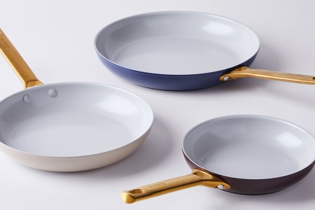 Three ceramic nonstick pans from Food52 and GreenPan. The pans are currently on sale for 24% off.