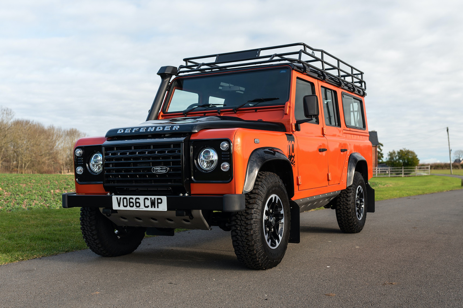 A 2016 four-door Land Rover Defender 110 Adventure in Phoenix Orange. This is the last of its kind to roll off the line in Solihull, and it's up for auction in February 2022 via Collecting Cars.