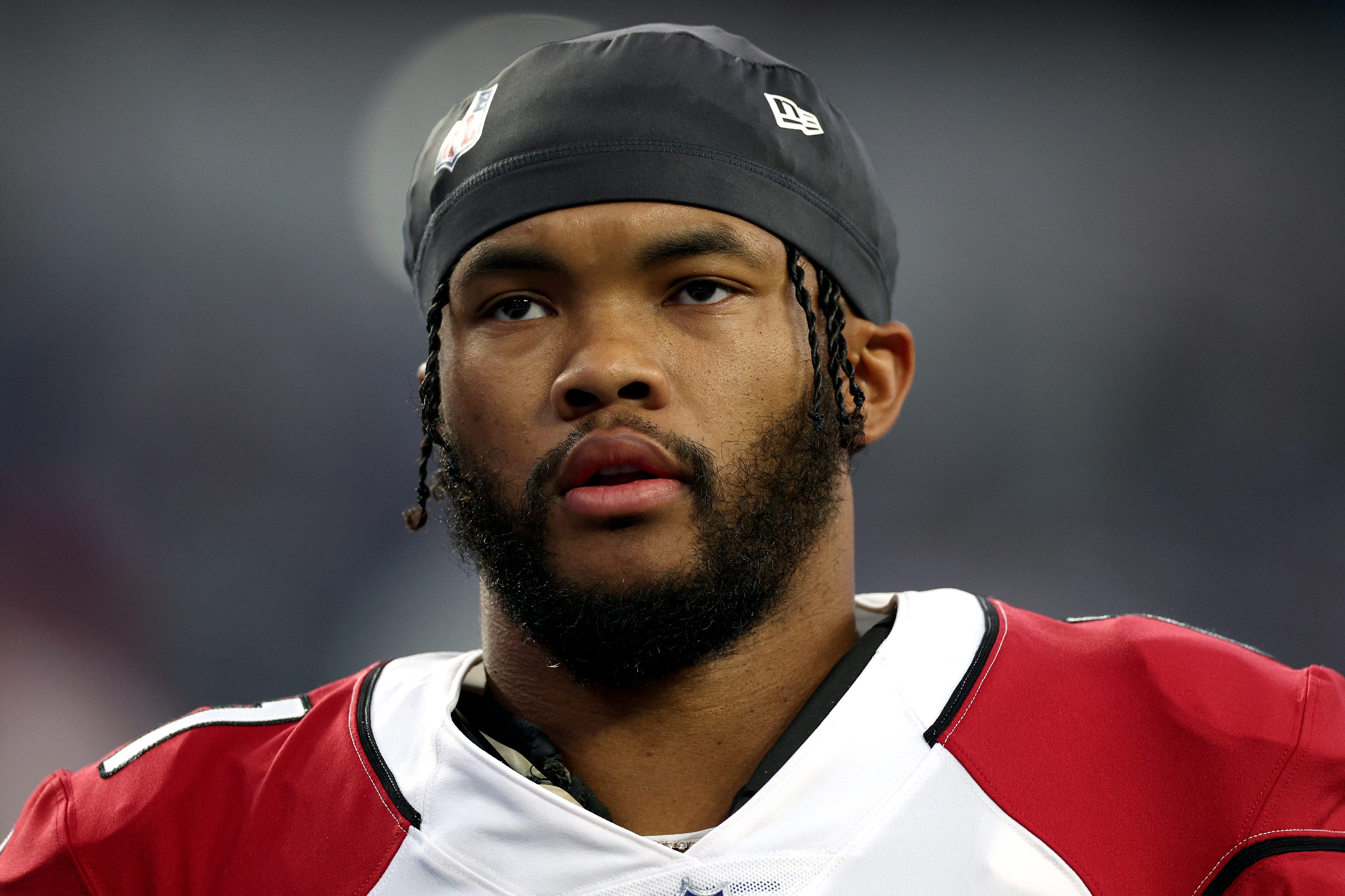 Kyler Murray of the Arizona Cardinals looks on before a game. The quarterback recently made his request for a new contract with the Cardinals public on social media.