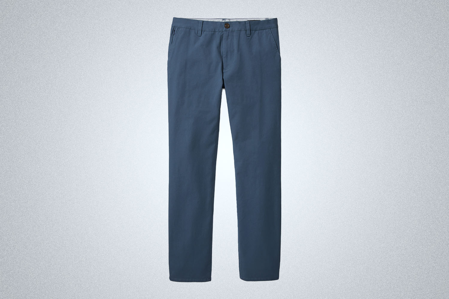 a pair of chinos on a grey background