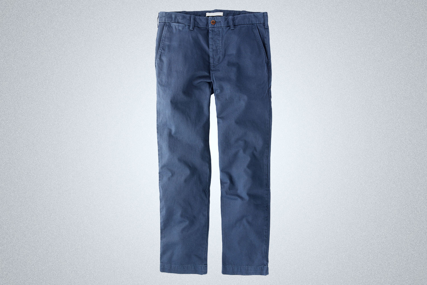 a pair fo chinos on a grey background 