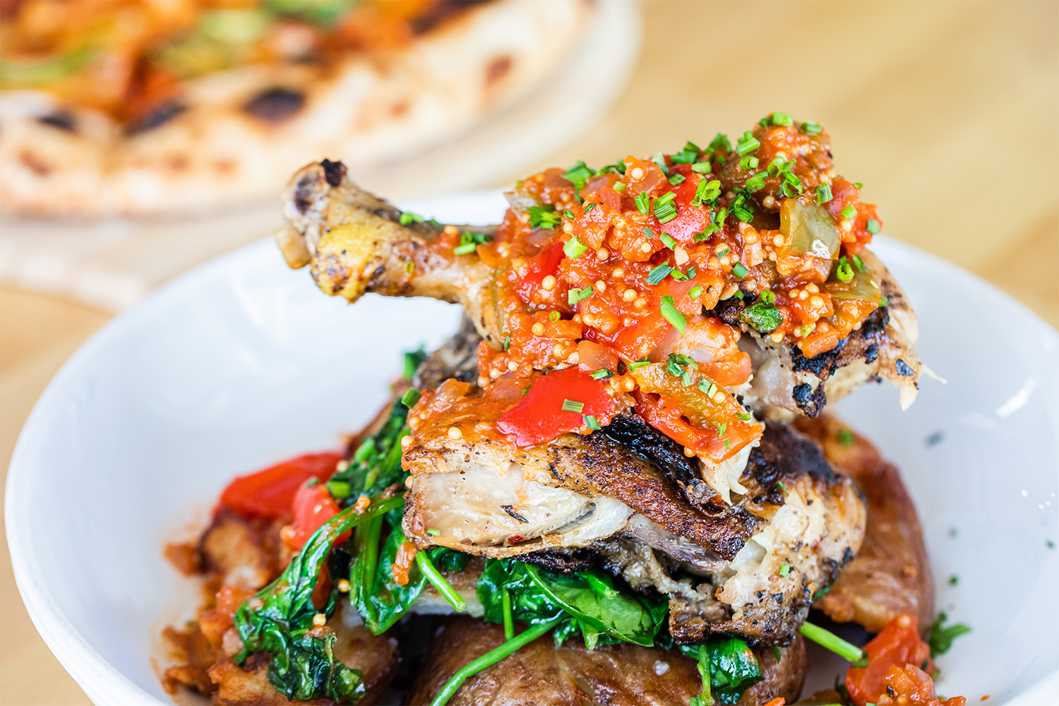 Chef Geoff Hundt's Confit Chicken Thighs with Smashed Red Potatoes and Pepper Conserva.