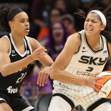 Candace Parker of the Chicago Sky looks to pass around Brianna Turner of the Phoenix Mercury during the 2021 WNBA Finals