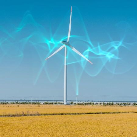 A wind turbine emitting invisible energy waves.