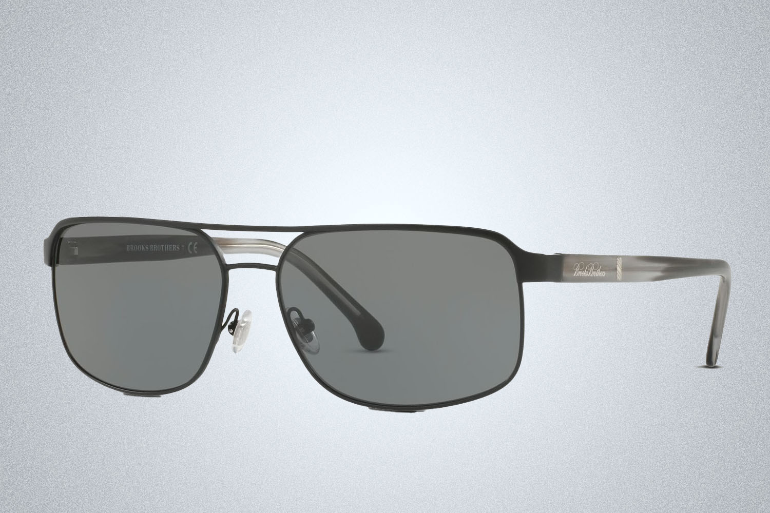 a pair of sunglasses on a grey background