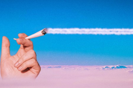 A hand holding a joint above the clouds while the smoke trails across the sky. Here's our guide to getting stoned while flying on a plane.