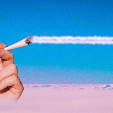 A hand holding a joint above the clouds while the smoke trails across the sky. Here's our guide to getting stoned while flying on a plane.