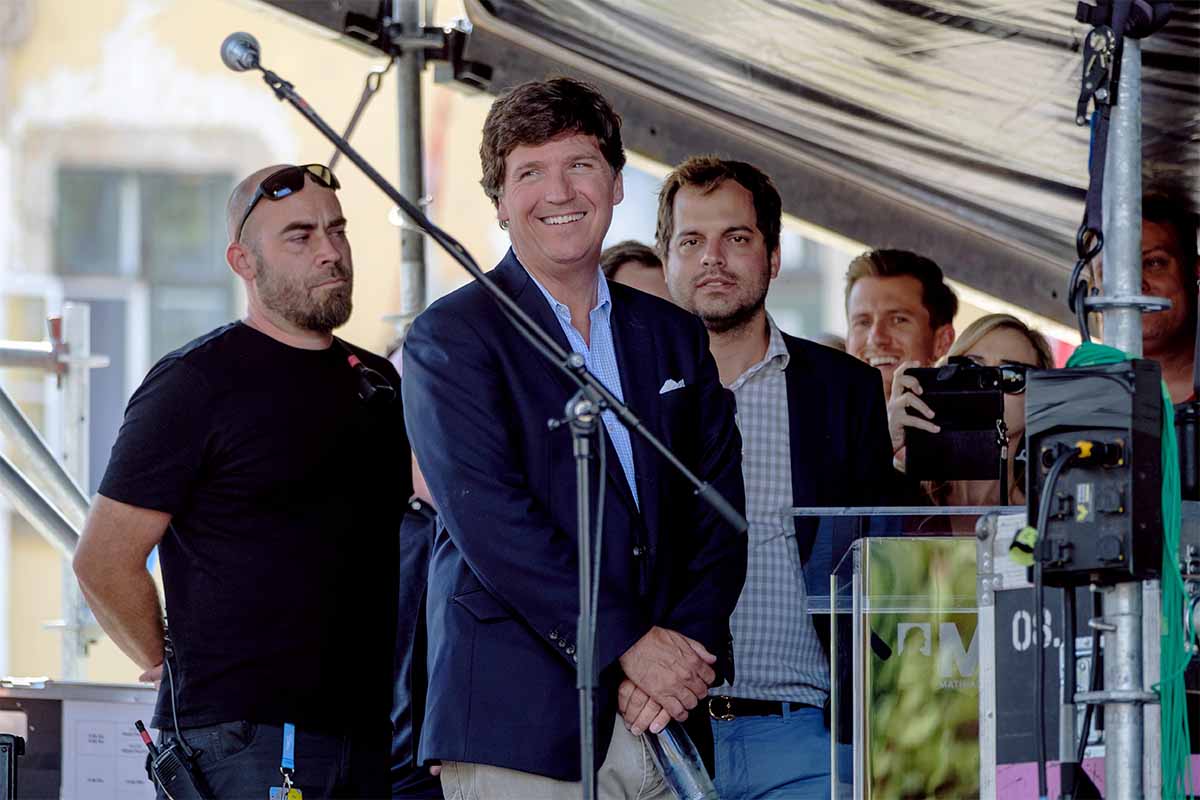 Tucker Carlson on stage before his speech during the Mathias Corvinus Collegium (MCC) Feszt on August 7, 2021 in Esztergom, Hungary